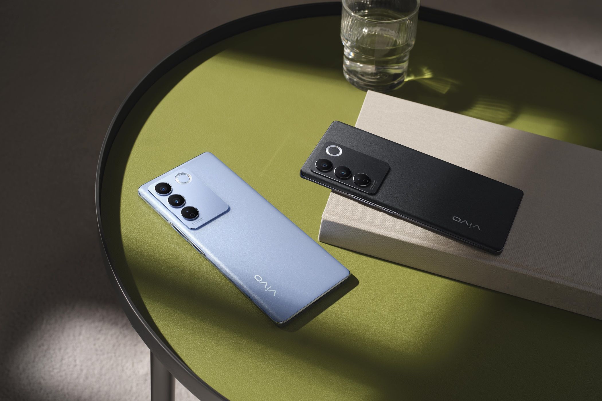vivo v27 blue and black on table