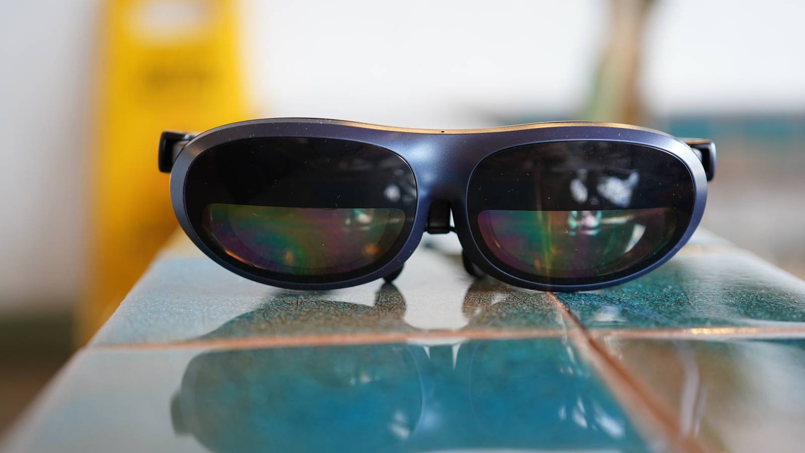 Rokid Max AR glasses on a surface. 