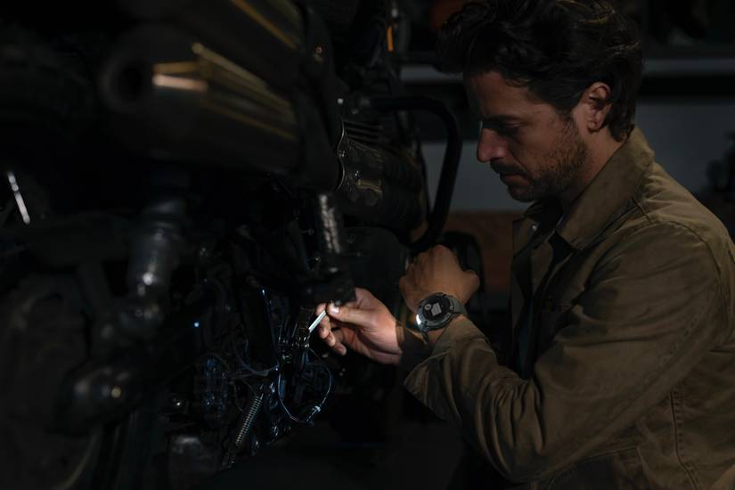 Garmin Instinct 2X Solar Tactical with LED light shining on man's wrist