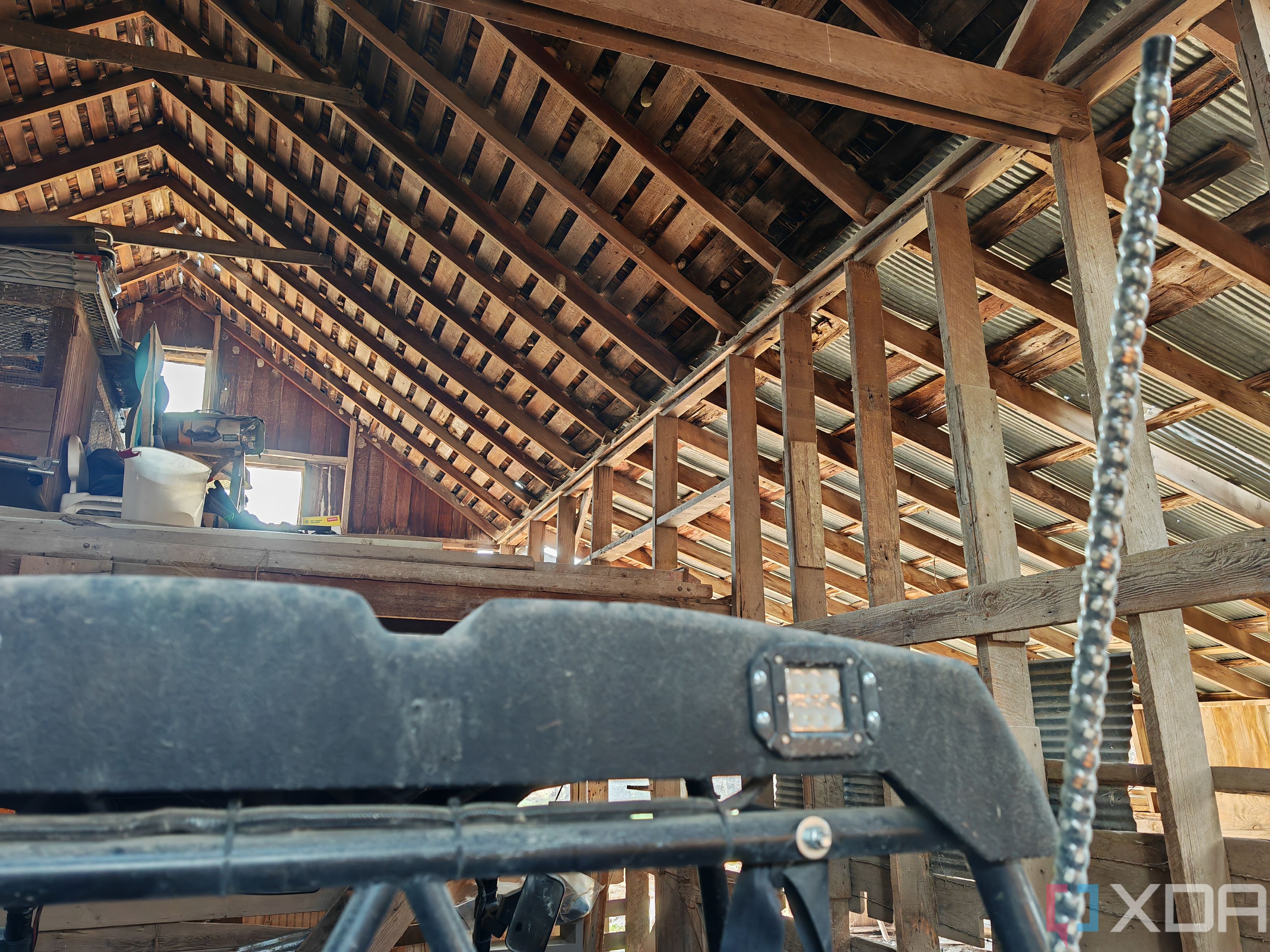 Photo inside of a barn roof rafters