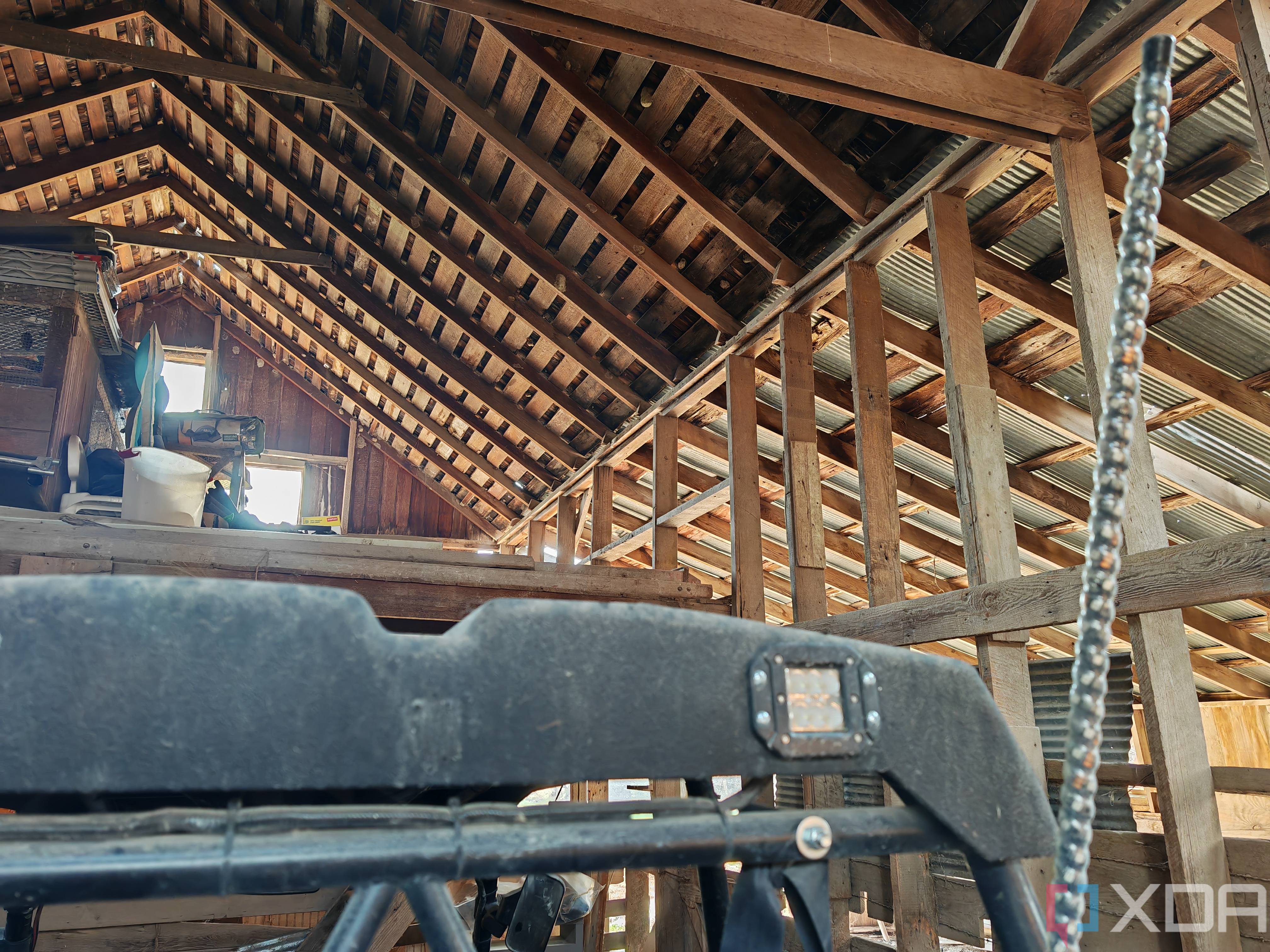 Photo inside of a barn roof rafters