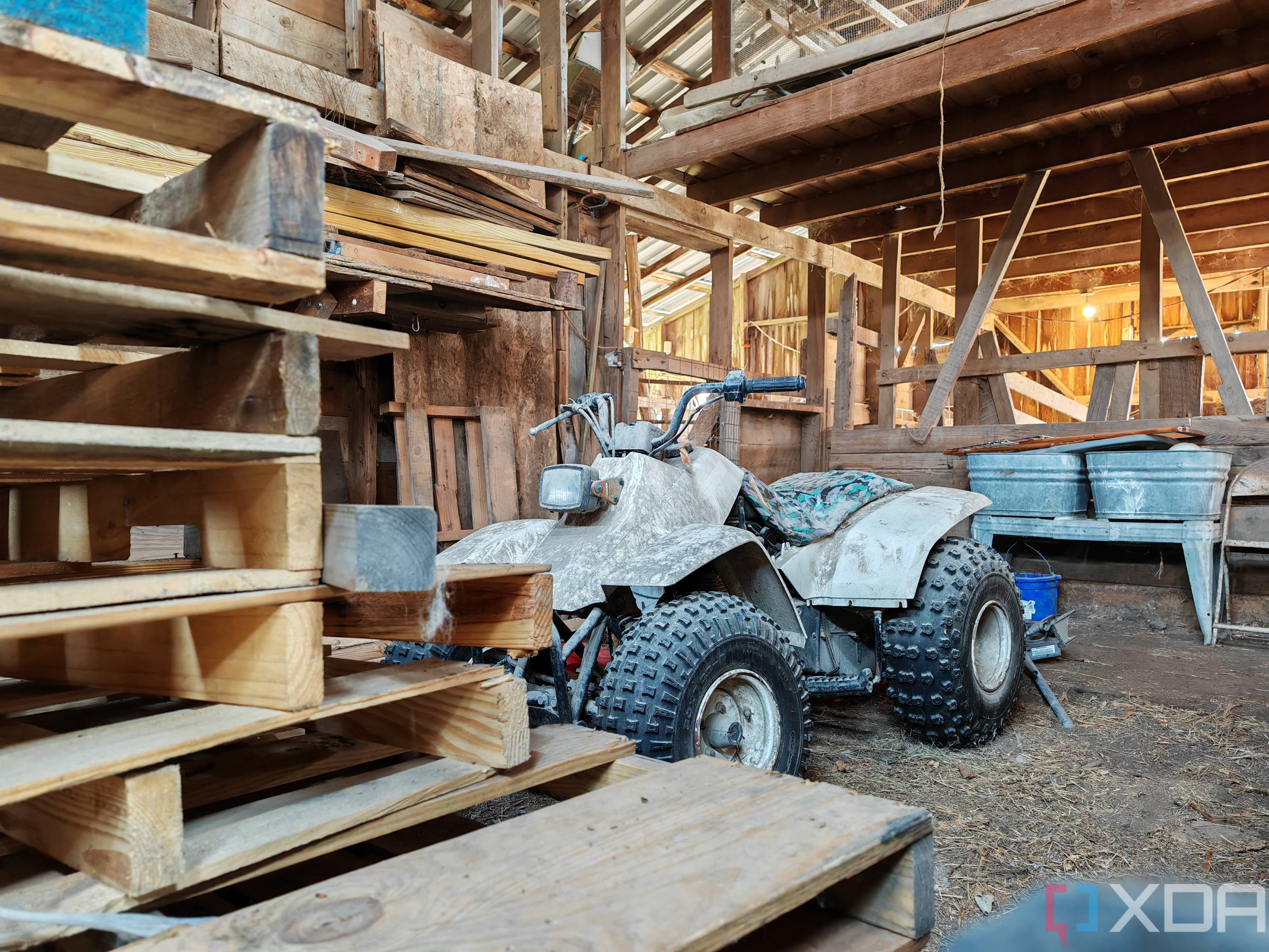Photo inside of a barn of an ATV