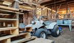 Photo inside of a barn of an ATV