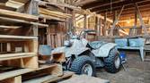 Photo inside of a barn of an ATV