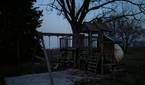 Photo of a playset at night