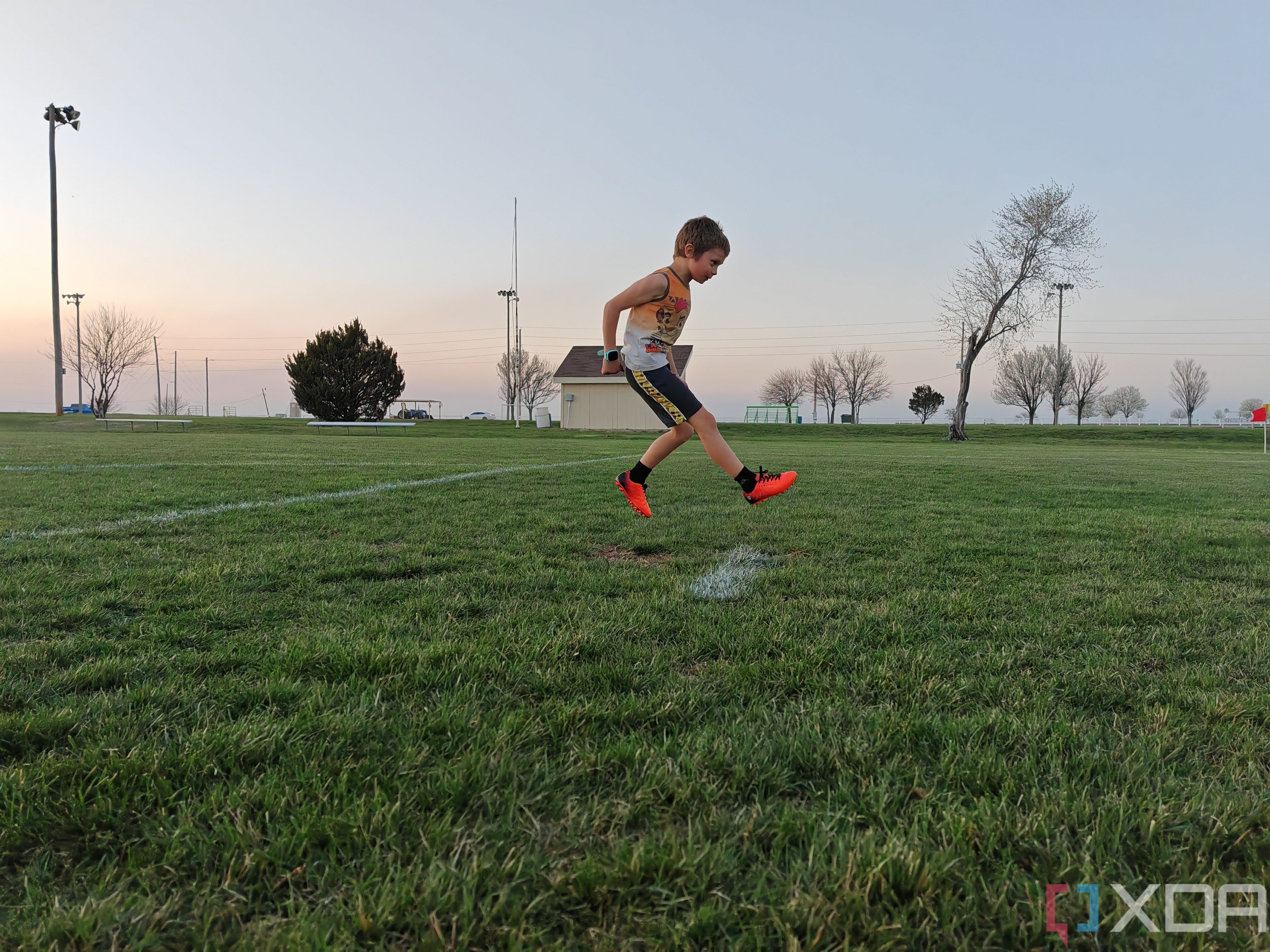 Child playing soccer photo taken using AI Motion Sense