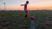 Child playing soccer photo taken using AI Motion Sense