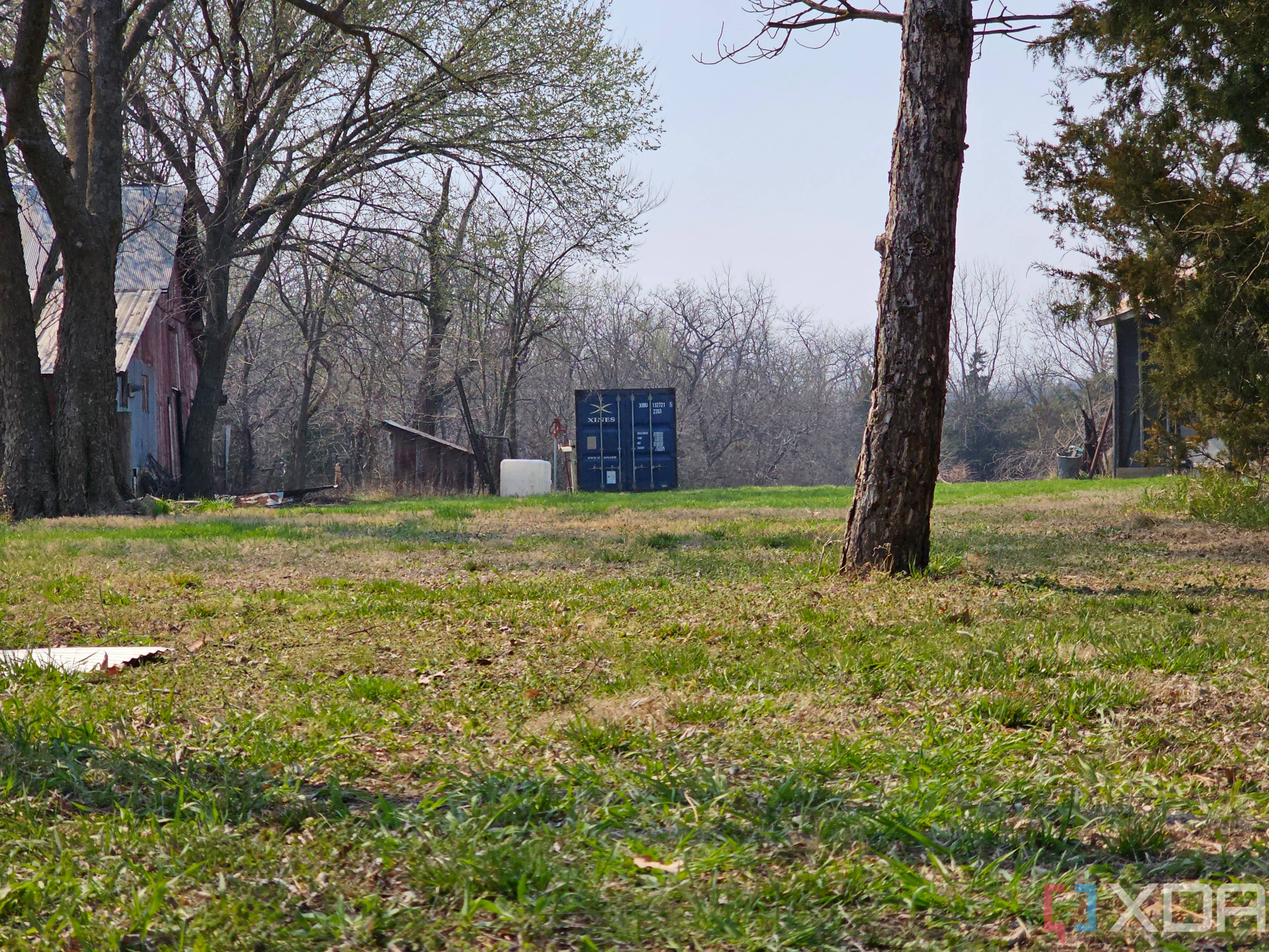Photo of a barn and shipping container at 3x zoom