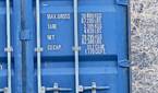 Photo of a barn and shipping container at 50x zoom