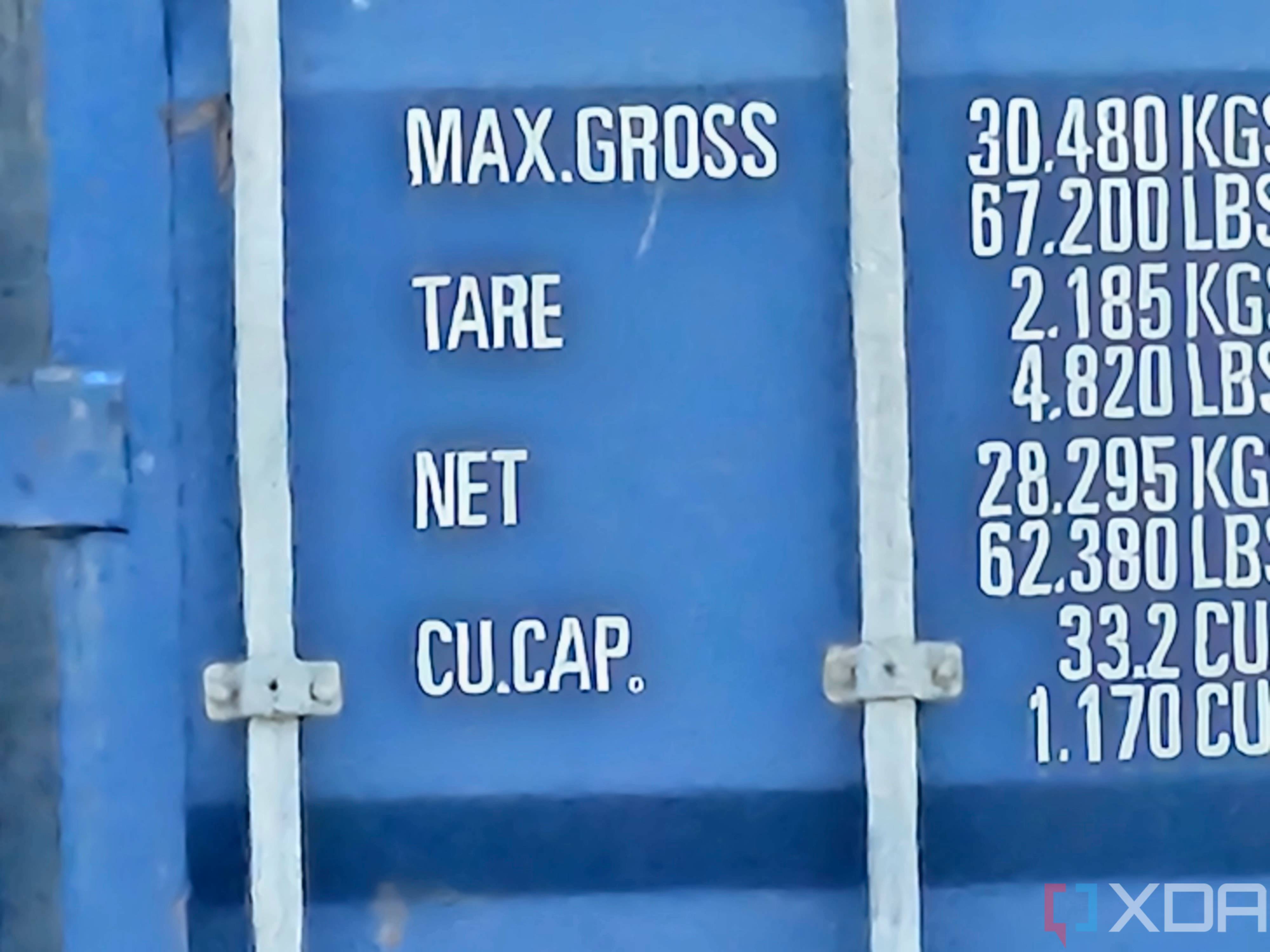 Photo of a barn and shipping container at 100x zoom