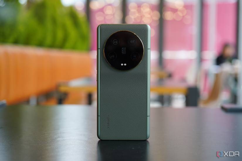 Xiaomi 13 Ultra in green standing on a desk