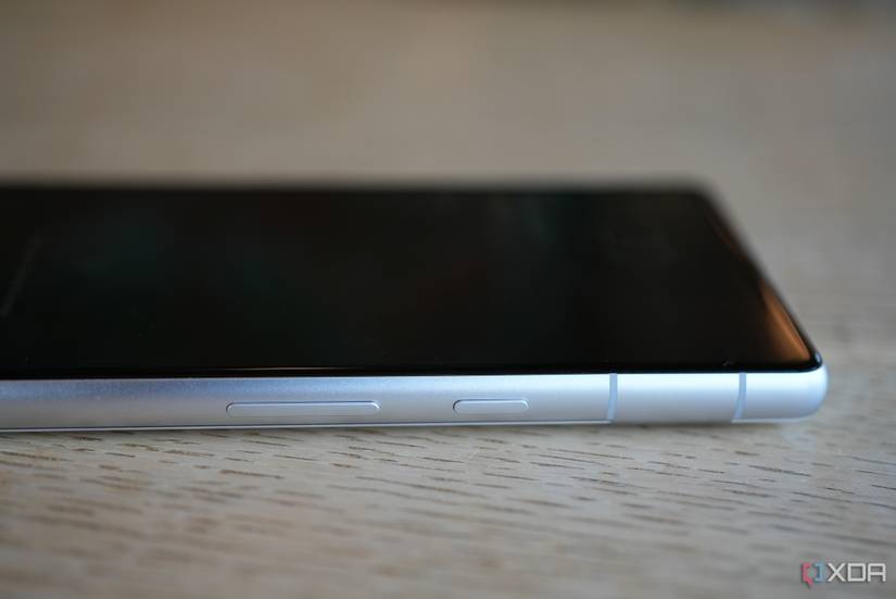 The Pixel 7a's power button sits above the volume rocker