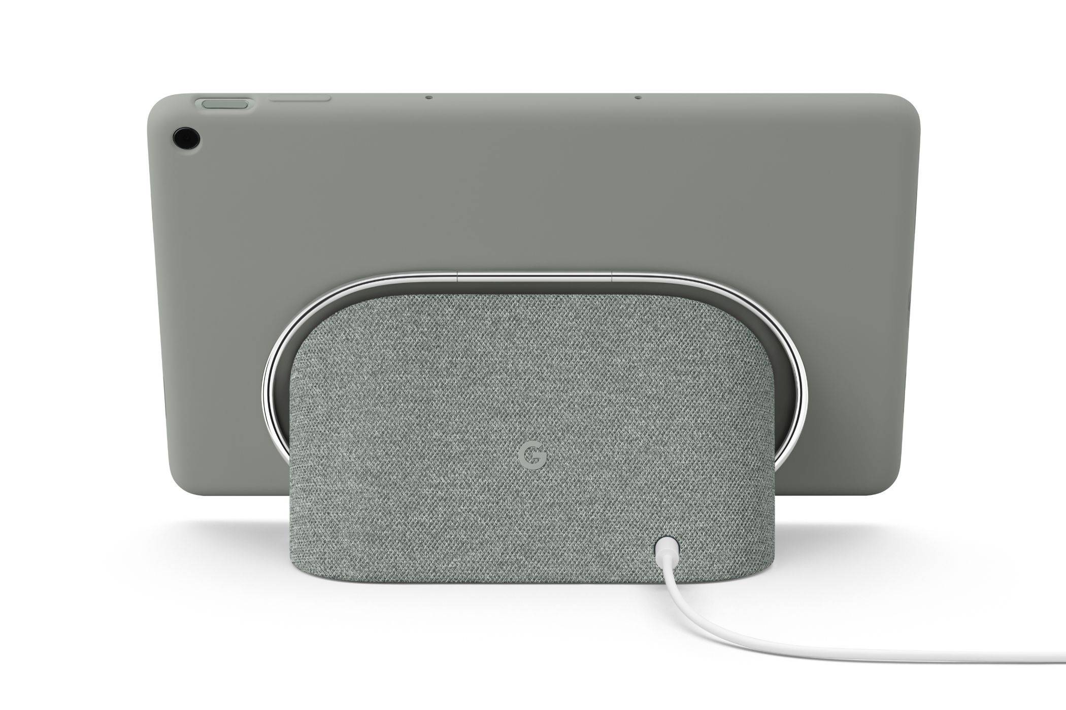 A render showing the Pixel Tablet docked on the bundled charging speaker dock.