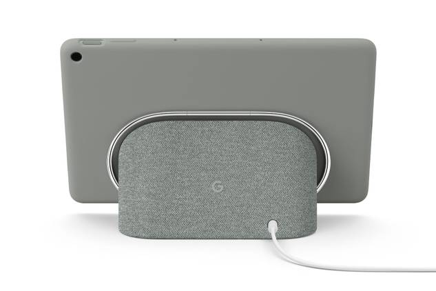 A render showing the Pixel Tablet docked on the bundled charging speaker dock.