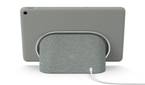 A render showing the Pixel Tablet docked on the bundled charging speaker dock.