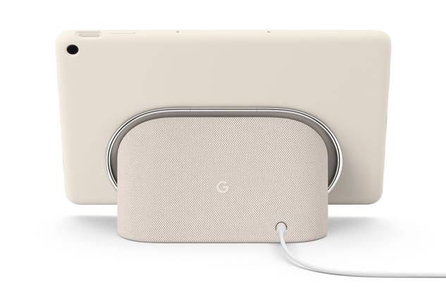 A render showing a Pixel Tablet in Porcelain color docked on the included accessory.