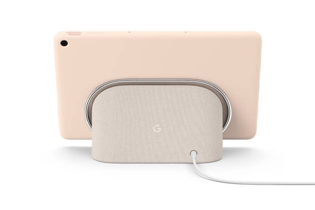 A render showing a Pixel Tablet in rose color docked on the included charging speaker dock.