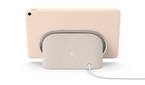 A render showing a Pixel Tablet in rose color docked on the included charging speaker dock.