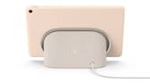 A render showing a Pixel Tablet in rose color docked on the included charging speaker dock.