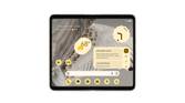 Porcelain Google Pixel Fold opne showing inner screen on white background.