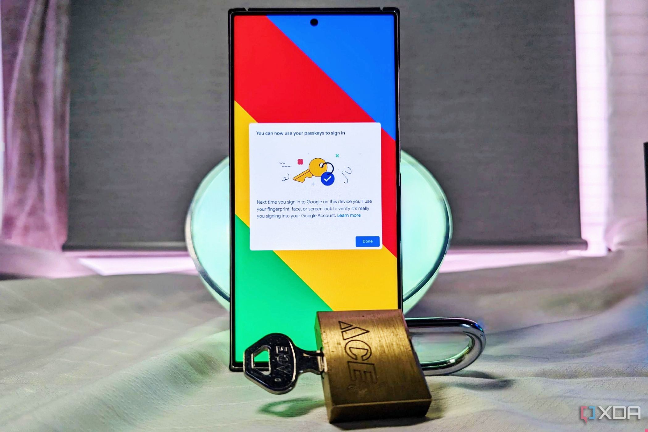 Samsung Galaxy S23 Ultra with on-screen confirmation next to a lock and key
