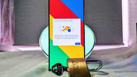 Samsung Galaxy S23 Ultra with on-screen confirmation next to a lock and key