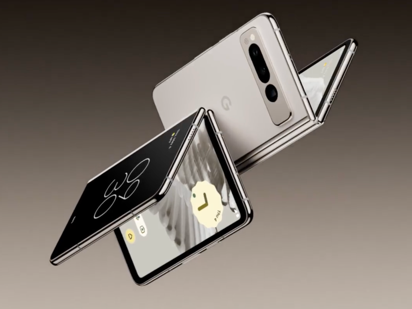 Google Pixel Fold in the air floating with inner and outer display showing.