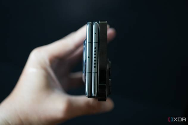 The Mate X3 (left) next to an iPhone 14 Pro Max (right)