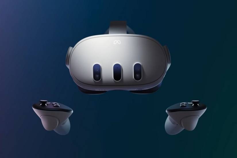 While Meta Quest 3 headset in the center, flanked by two game controllers