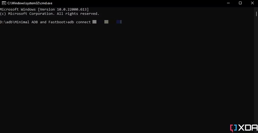 Screenshot of command prompt window with adb connect command.