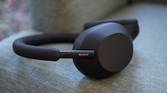 Sony WH-1000XM5 headphones on a sofa