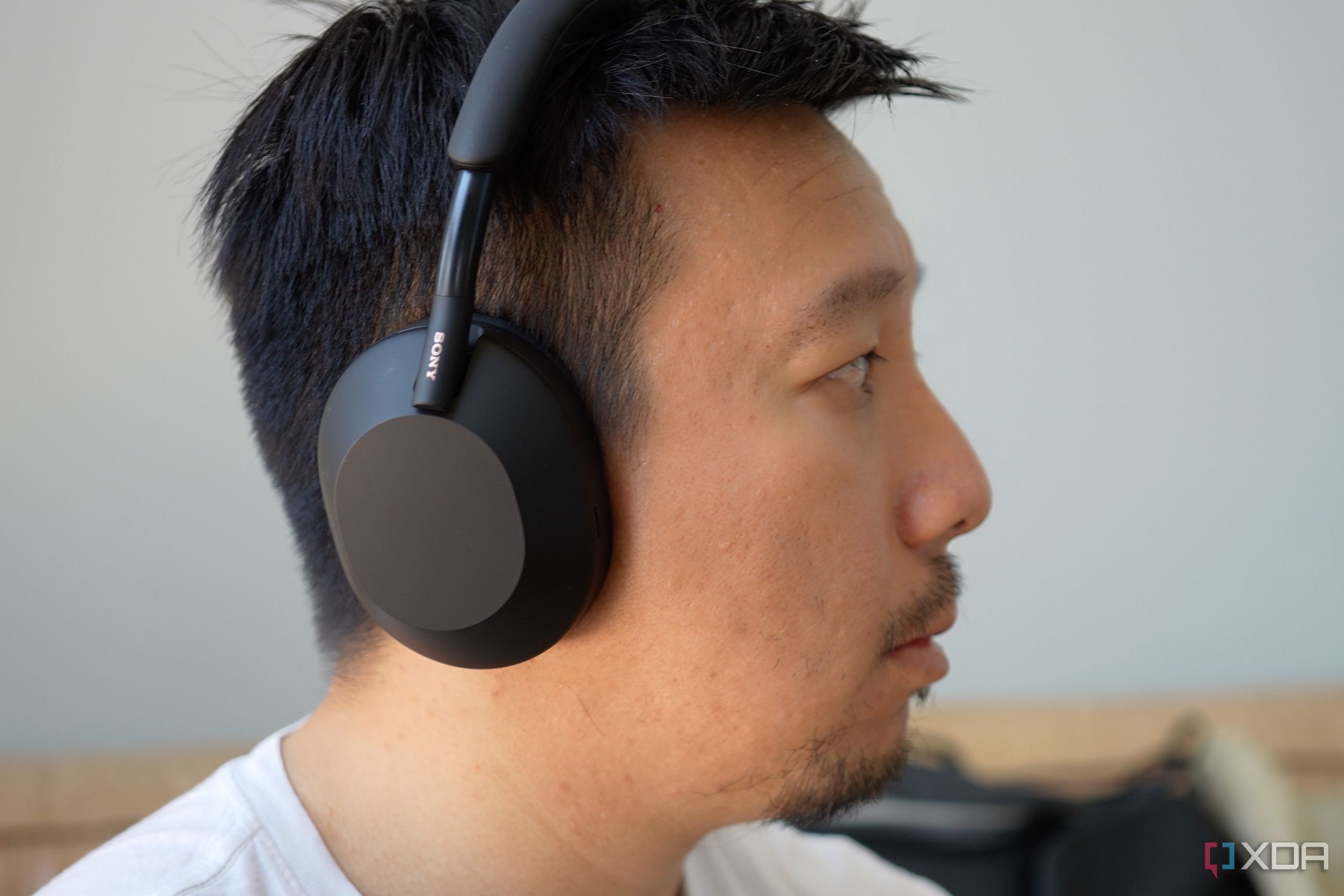 The Sony WH-1000XM5 on the head. 