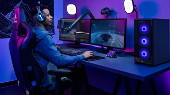 Person playing games on a PC while using Elgato streaming accessories.
