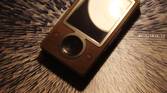 Close up of Microsoft Zune brown color on a textured surface