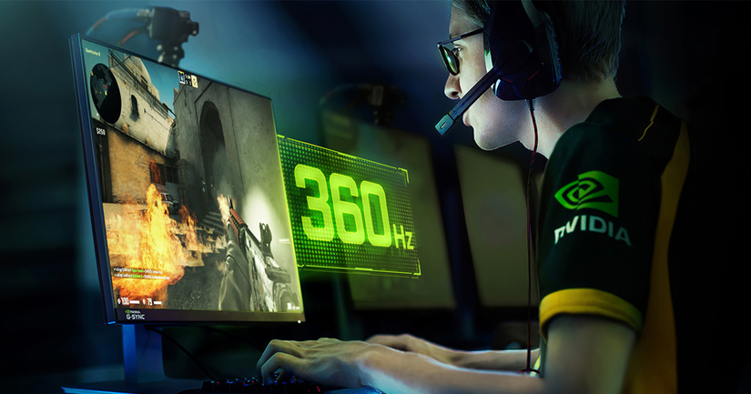 Gamer with headphones and Nvidia shirt playing a game at 360Hz