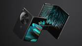 OnePlus Open with front and back shown, feather background on screen