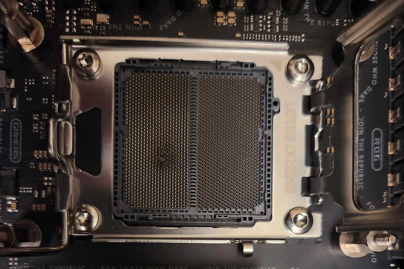 Close up of a Ryzen 7 7800X3D motherboard socked burnt 
