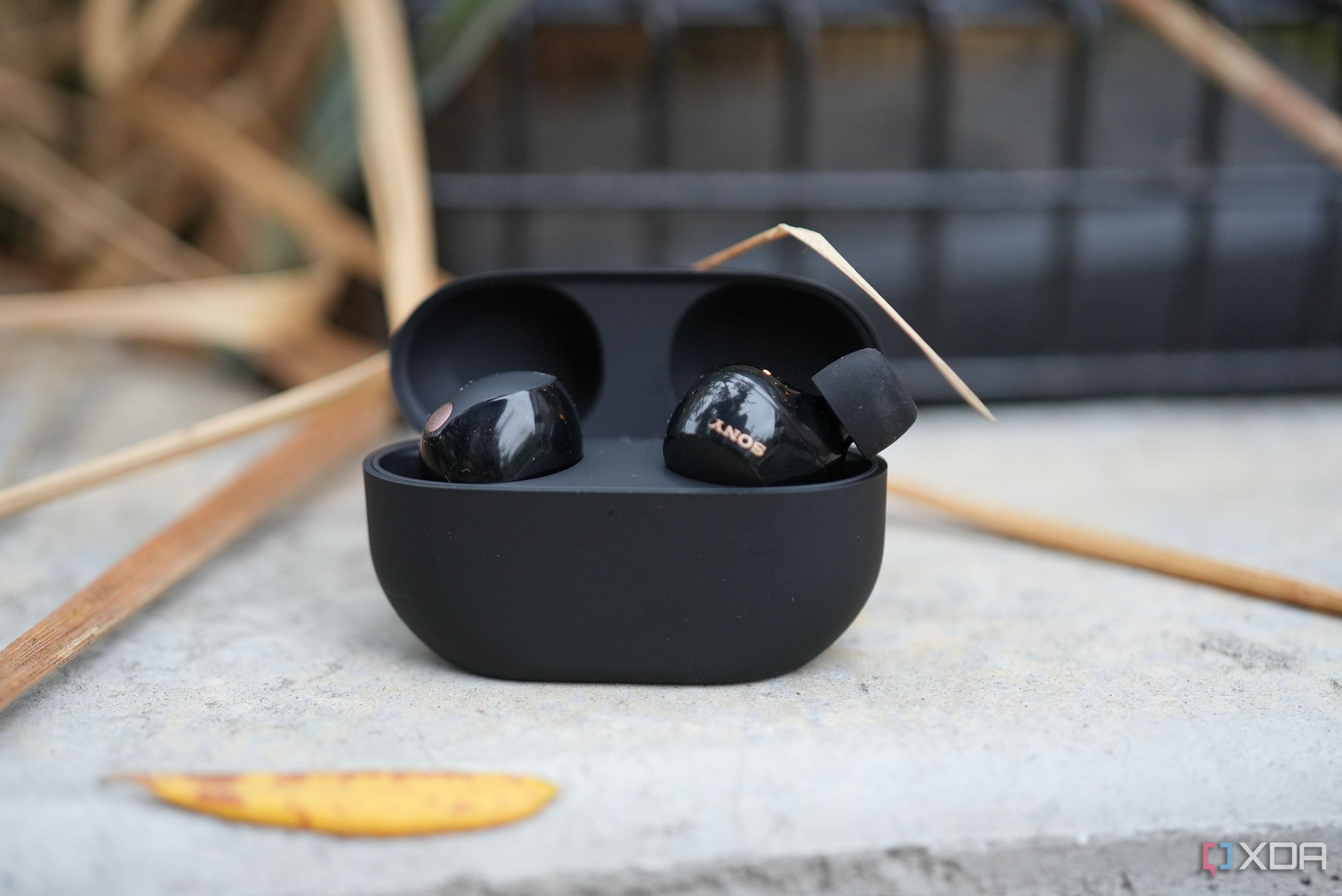The glossy earbuds and tight case slots make the buds hard to take out