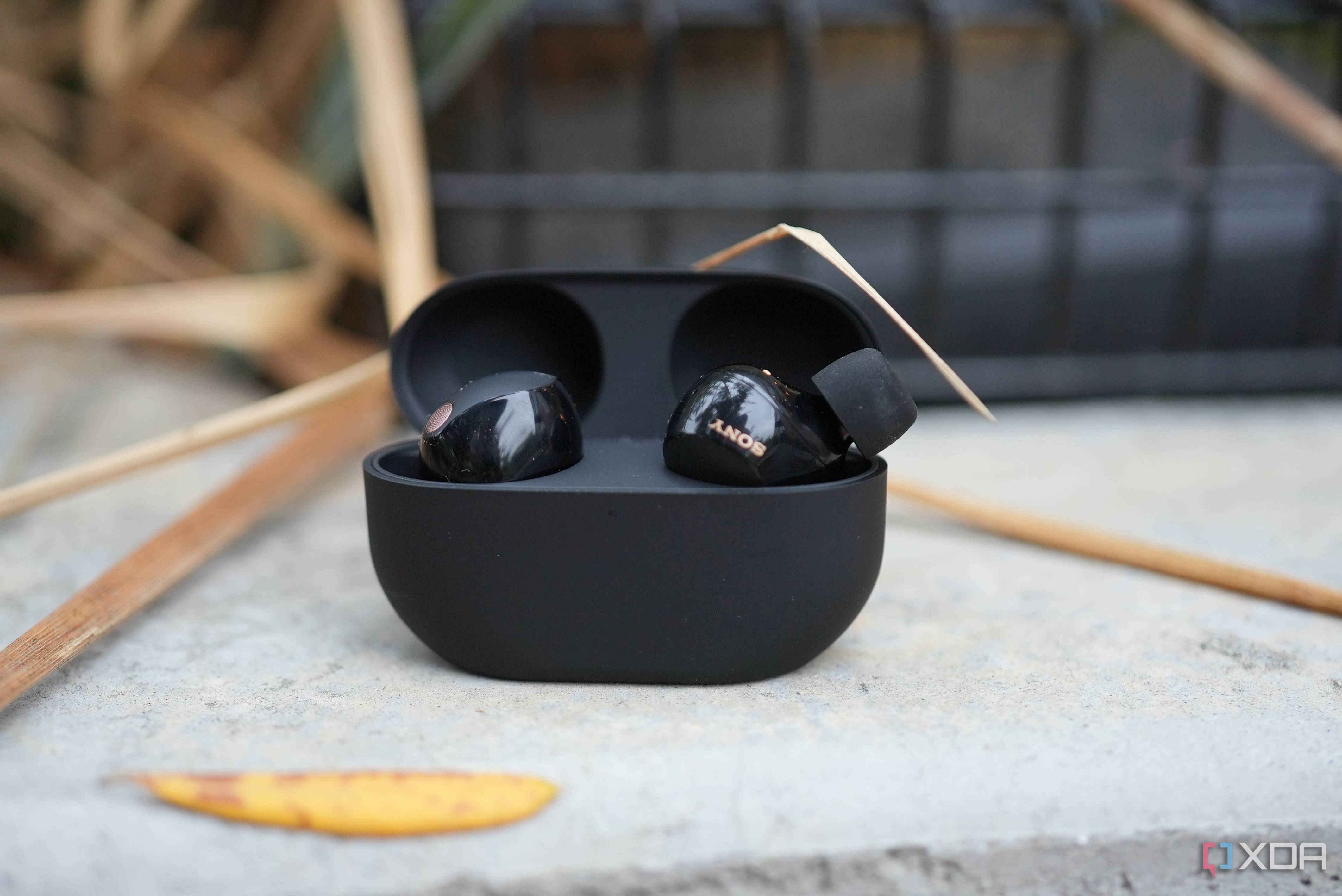 The glossy earbuds and tight case slots make the buds hard to take out
