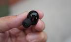 sony XM5 earbuds in the hand