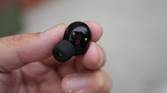 sony XM5 earbuds in the hand