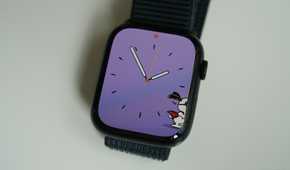 An Apple Watch Series 9 with a snoopy watch face