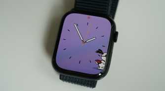 An Apple Watch Series 9 with a snoopy watch face