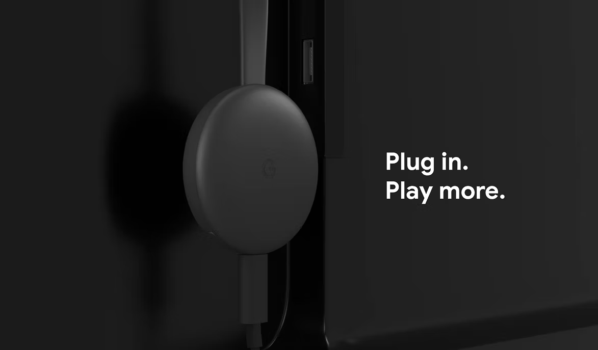 Chromecast in the back of a TV with a caption saying 'Plug in. Play more.'
