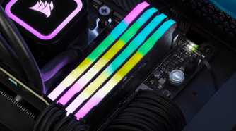 Close-up shot of RGB RAM modules on motherboard.