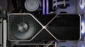 Closeup of black graphics card mounted vertically inside a PC