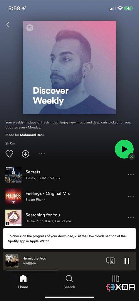 Download on Apple Watch in progress pop-up on Spotify iOS app.
