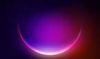 A colorful bubble glowing in a gradient from purple to red over a dark background