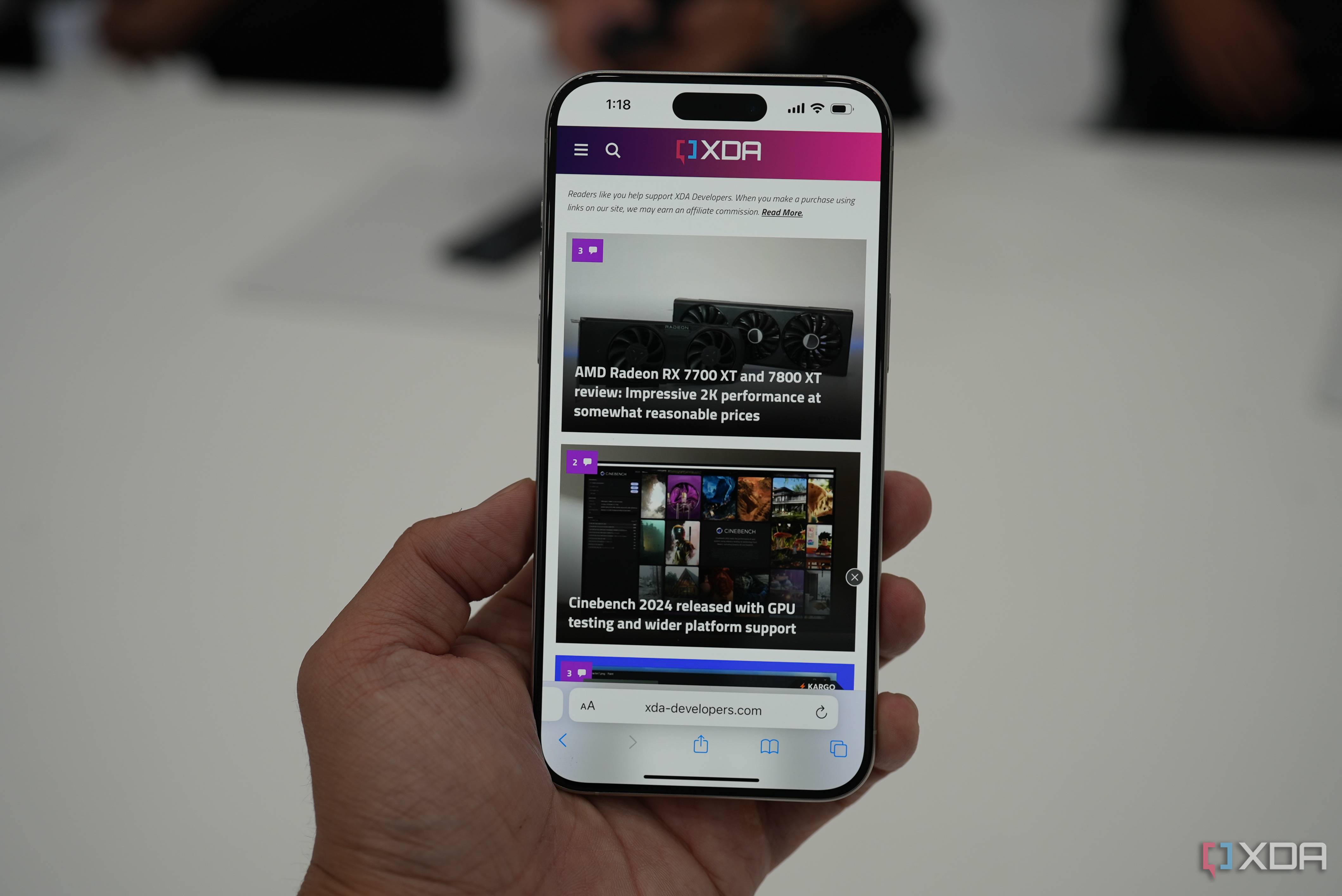 iPhone 15 Pro Max displaying XDA front page