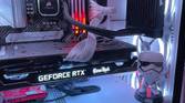 Stormtrooper action figure inside gaming PC with lights.